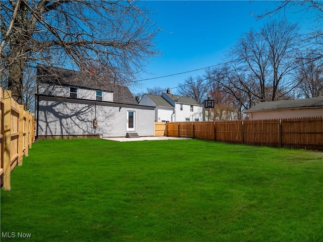 view of yard featuring a fenced backyard and a patio