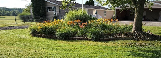 view of yard featuring fence