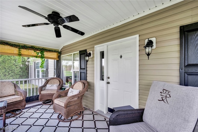 exterior space with a porch and a ceiling fan