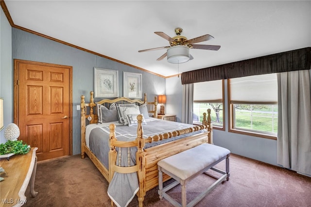 bedroom with vaulted ceiling, carpet floors, a ceiling fan, and crown molding