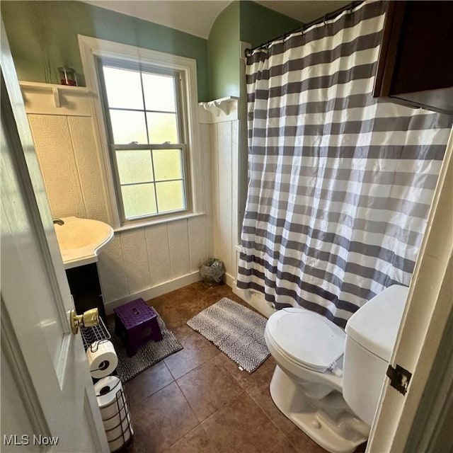bathroom featuring tile patterned floors, vanity, toilet, and a shower with curtain