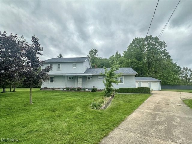 3799 Larchmont Ave NE, Bazetta, OH 44483 - traditional home featuring a garage, a front yard, driveway, and a shingled roof