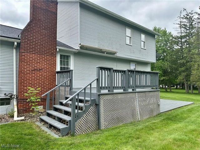 3799 Larchmont Ave NE, Bazetta, OH 44483 - rear view of house with a yard, a deck, and a chimney