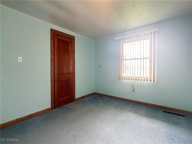 3799 Larchmont Ave NE, Bazetta, OH 44483 - unfurnished room with carpet floors and baseboards
