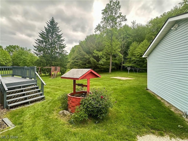 3799 Larchmont Ave NE, Bazetta, OH 44483 - view of green lawn with a wooden deck