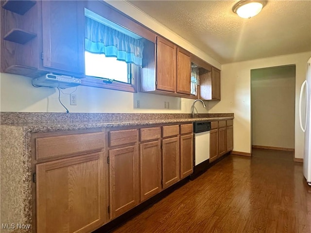 3799 Larchmont Ave NE, Bazetta, OH 44483 - kitchen with open shelves, dark wood-style flooring, a sink, brown cabinets, and a textured ceiling