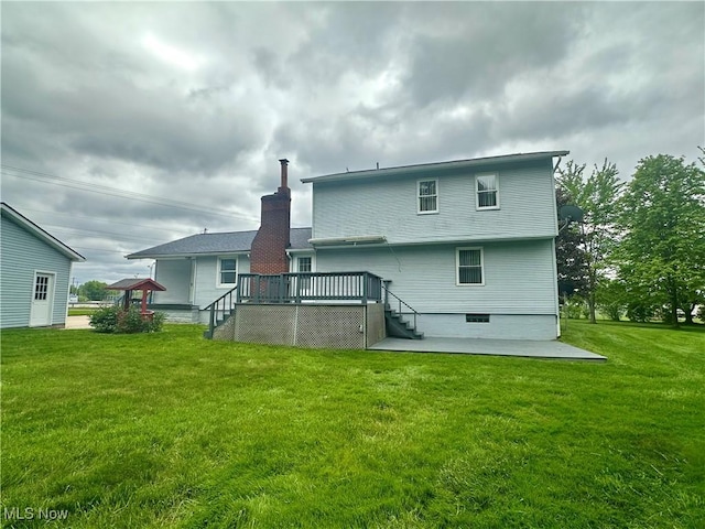 3799 Larchmont Ave NE, Bazetta, OH 44483 - back of house featuring a deck, a patio, a lawn, stairway, and a chimney