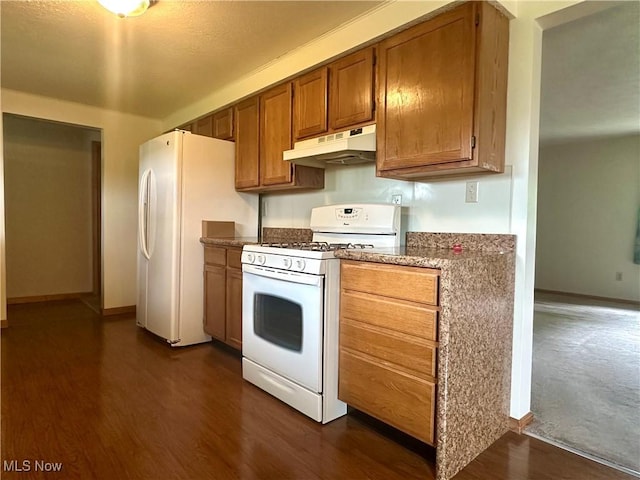 3799 Larchmont Ave NE, Bazetta, OH 44483 - kitchen featuring white appliances, under cabinet range hood, brown cabinets, dark wood-style floors, and baseboards