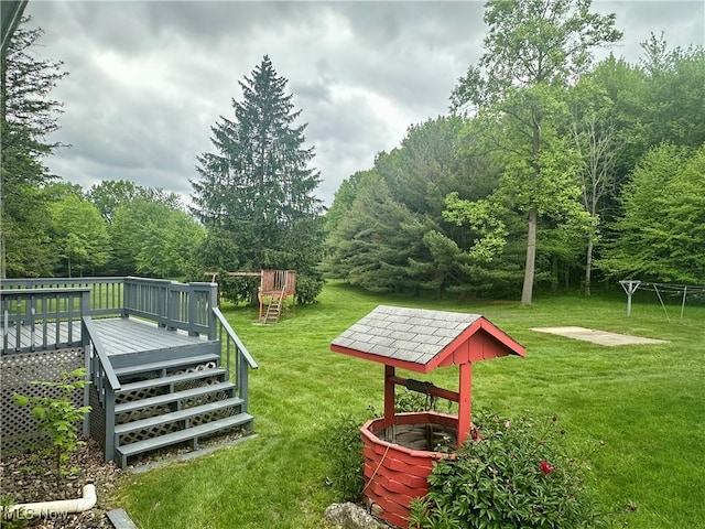 3799 Larchmont Ave NE, Bazetta, OH 44483 - view of green lawn featuring a deck