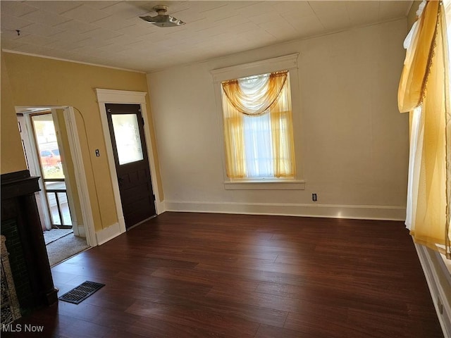 606 S 7th St, Cambridge, OH 43725 - entryway with hardwood / wood-style flooring, baseboards, and ornamental molding
