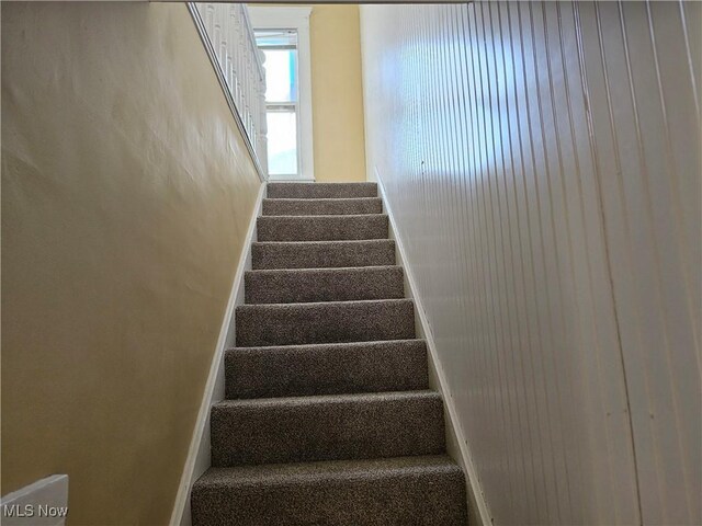 606 S 7th St, Cambridge, OH 43725 - stairway featuring baseboards