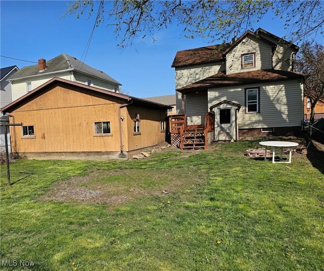 606 S 7th St, Cambridge, OH 43725 - rear view of property featuring a deck