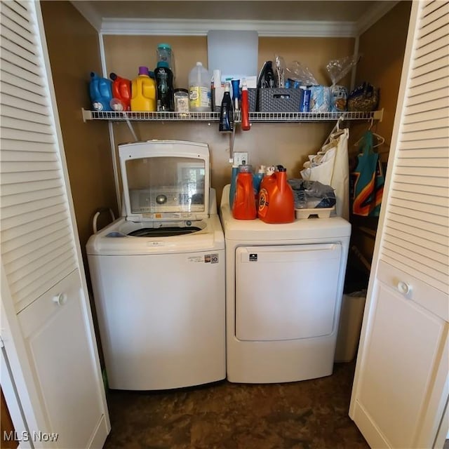 243 Hagan St, Adena, OH 43901 - laundry room featuring laundry area, washing machine and dryer, and ornamental molding