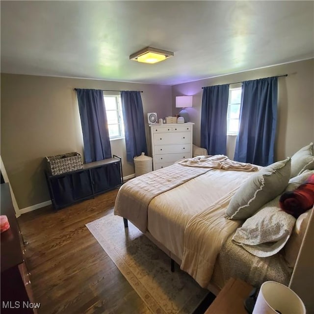 243 Hagan St, Adena, OH 43901 - bedroom featuring baseboards and wood finished floors