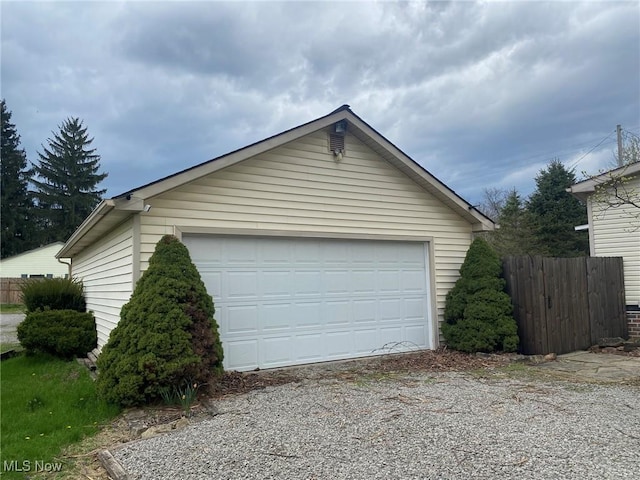detached garage with fence