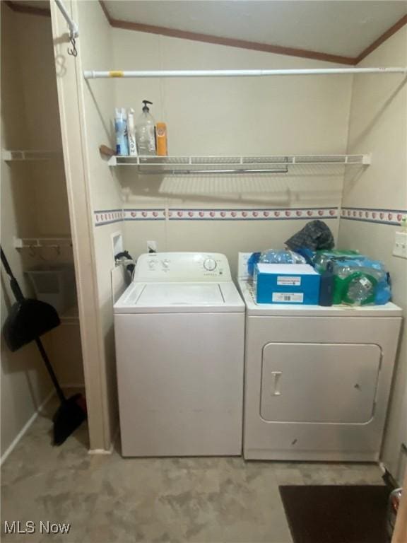 washroom with crown molding, laundry area, and independent washer and dryer