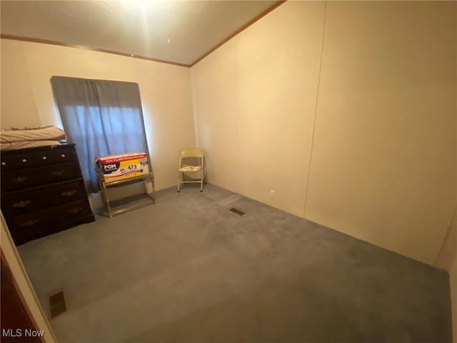 bedroom featuring visible vents and carpet flooring