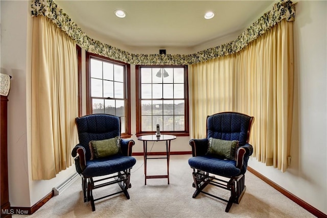 living area with baseboards, carpet flooring, and recessed lighting