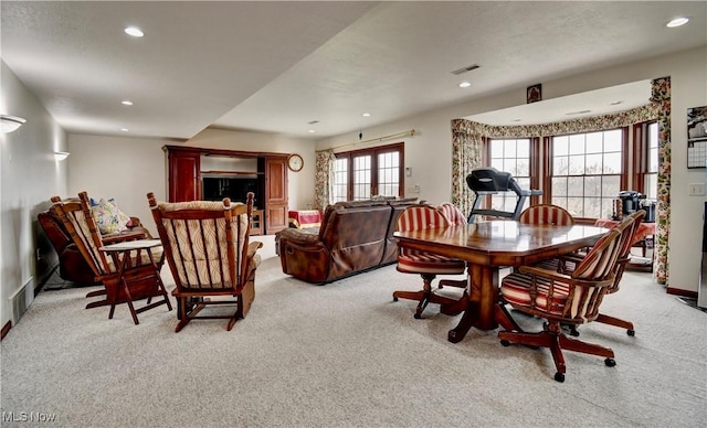 dining room featuring visible vents, recessed lighting, and light colored carpet