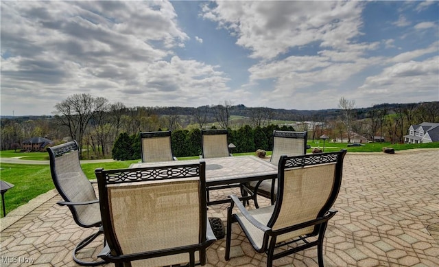 view of patio featuring outdoor dining space