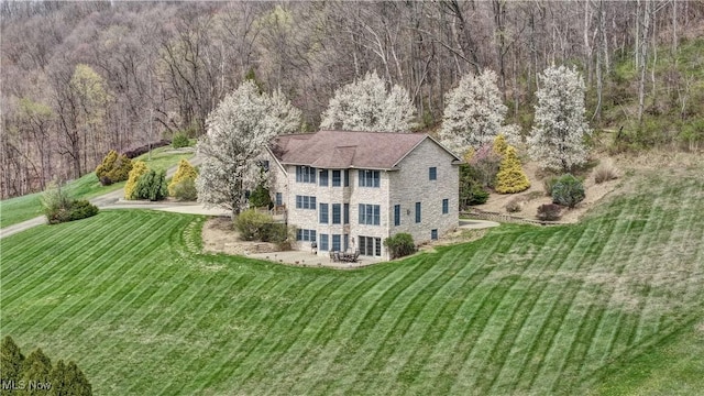 drone / aerial view with a view of trees