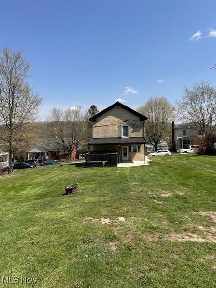 214 Jarvis St, Bowerston, OH 44695 - back of property with a yard