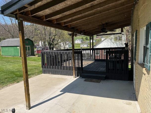 214 Jarvis St, Bowerston, OH 44695 - exterior space featuring an outdoor structure, a shed, and ceiling fan