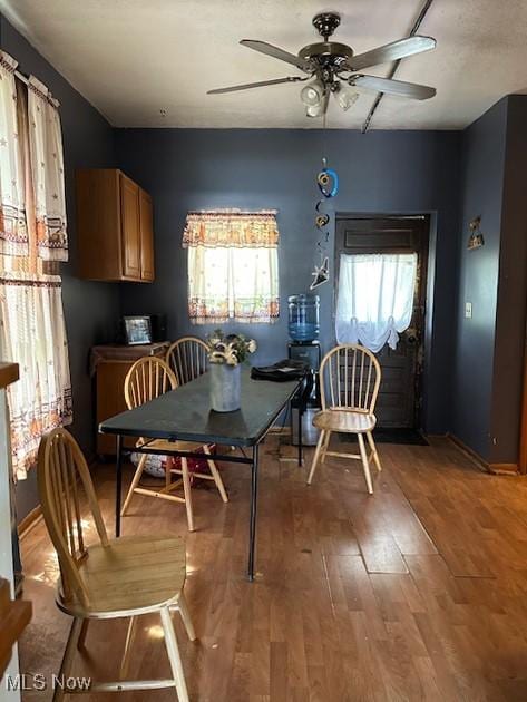 214 Jarvis St, Bowerston, OH 44695 - dining room featuring light wood finished floors and a ceiling fan
