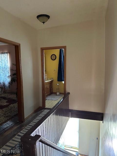 214 Jarvis St, Bowerston, OH 44695 - hall with wood finished floors and an upstairs landing