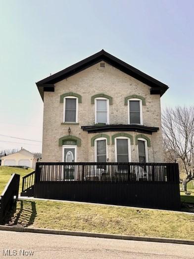 214 Jarvis St, Bowerston, OH 44695 - back of house with a porch