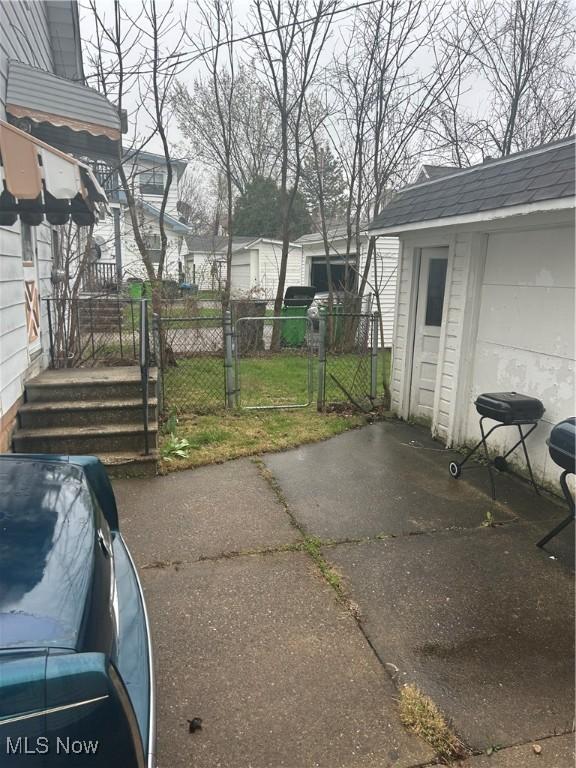 view of patio featuring fence