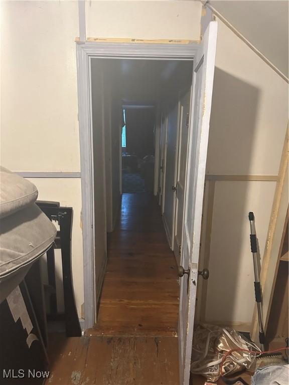 hall featuring dark wood-type flooring