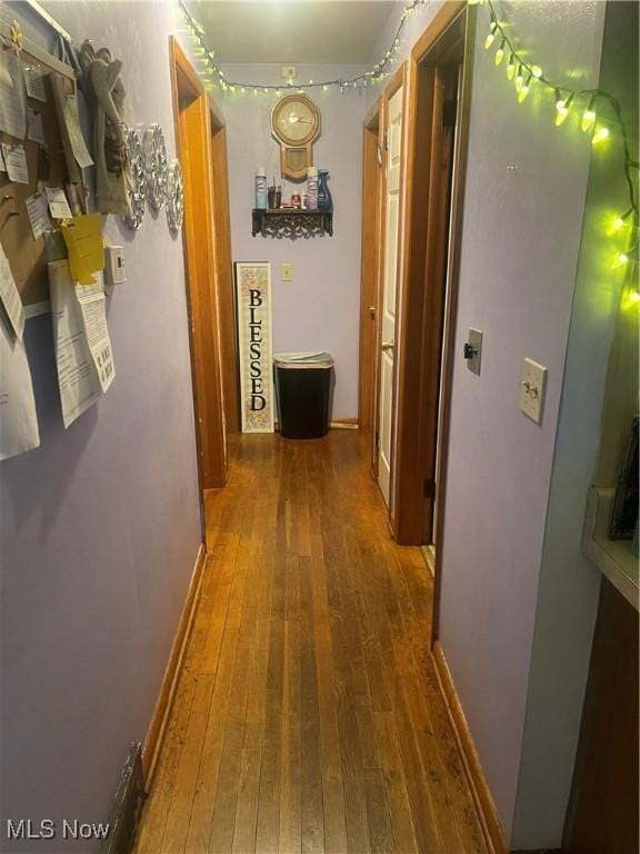 1166 Raymond St NW, Warren, OH 44485 - hallway with hardwood / wood-style floors