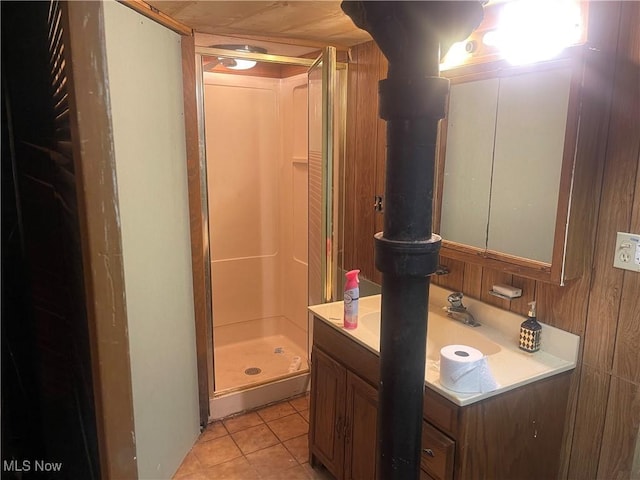 1166 Raymond St NW, Warren, OH 44485 - bathroom featuring vanity, a shower stall, and tile patterned flooring