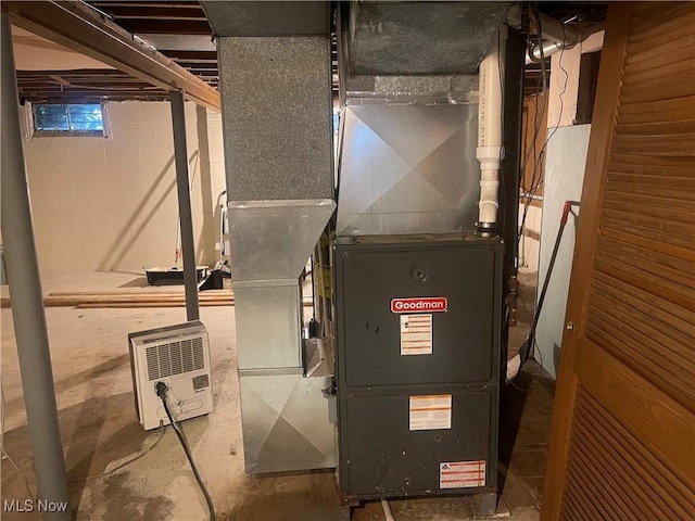 1166 Raymond St NW, Warren, OH 44485 - utility room with heating unit