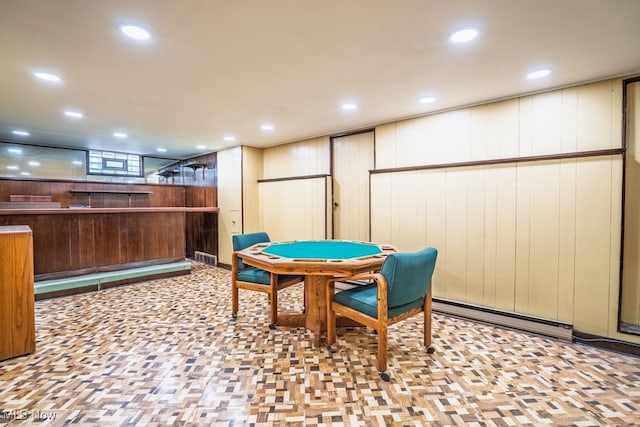 3867 E 177th St, Cleveland, OH 44128 - playroom featuring recessed lighting, bar area, wood walls, and baseboard heating