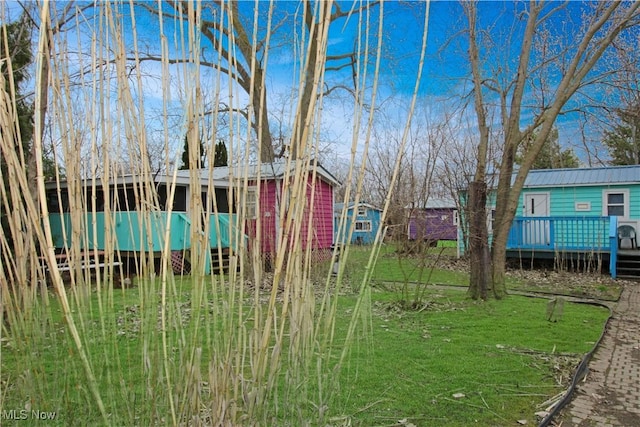 1233 Fox Unit 40, Middle Bass, OH 43446 - view of yard with a wooden deck