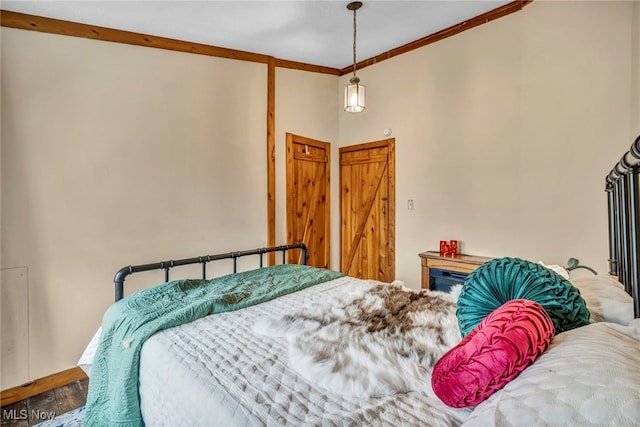 24455 Tryon Rd, Bedford, OH 44146 - bedroom with ornamental molding and wood finished floors
