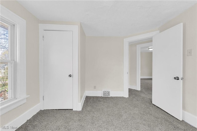 201 Alberti Ct, Akron, OH 44310 - unfurnished room featuring light carpet and baseboards