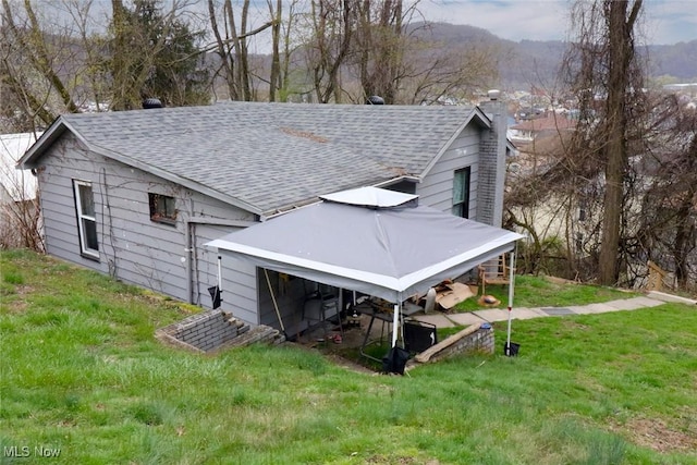 view of outdoor structure with a mountain view