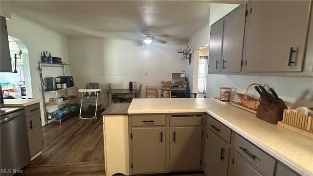 142 W Main St, Hopedale, OH 43976 - kitchen featuring crown molding, arched walkways, a ceiling fan, and a peninsula