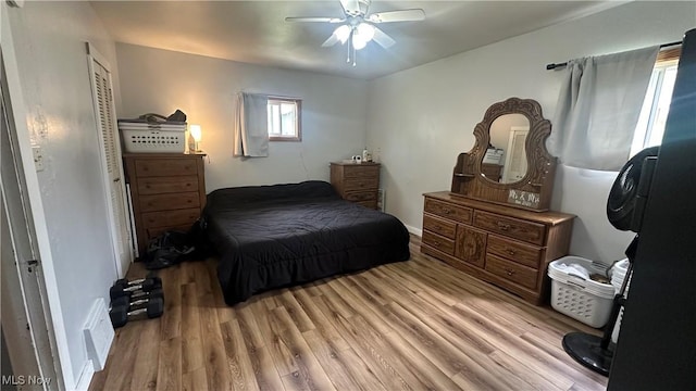 142 W Main St, Hopedale, OH 43976 - bedroom with light wood-style floors, baseboards, and a ceiling fan