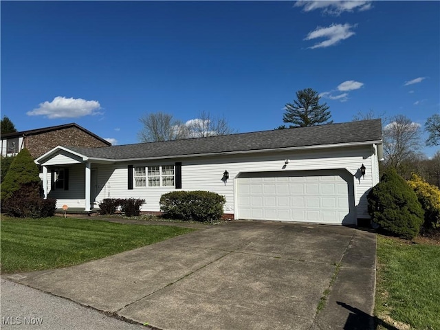 ranch-style house featuring a garage, roof with shingles, a front yard, and concrete driveway