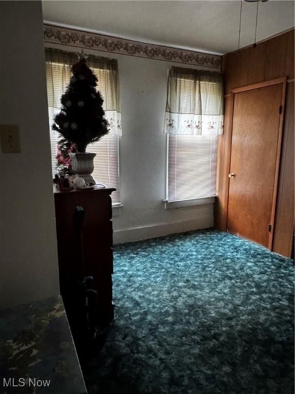 1514 Commerce St, Wellsville, OH 43968 - unfurnished bedroom featuring carpet and baseboards