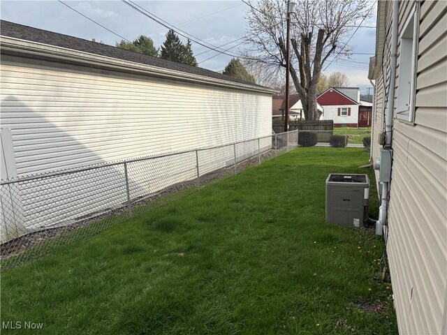 101 Sunset Ln, Follansbee, WV 26037 - view of yard featuring fence and central AC unit
