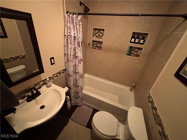 101 Sunset Ln, Follansbee, WV 26037 - full bath with tile patterned floors, toilet, tile walls, shower / bathtub combination with curtain, and vanity