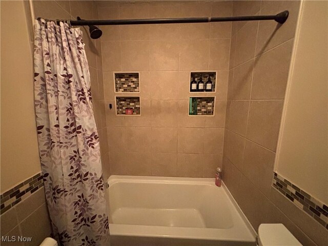 101 Sunset Ln, Follansbee, WV 26037 - bathroom featuring shower / tub combo, tile walls, and toilet
