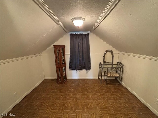 101 Sunset Ln, Follansbee, WV 26037 - bonus room with vaulted ceiling, a textured ceiling, and baseboards