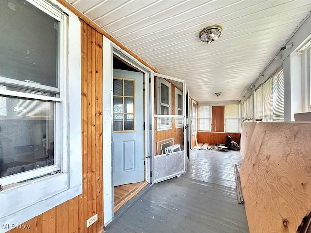 unfurnished sunroom with a healthy amount of sunlight