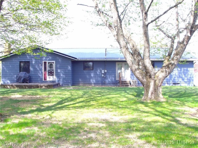 exterior space featuring a front lawn